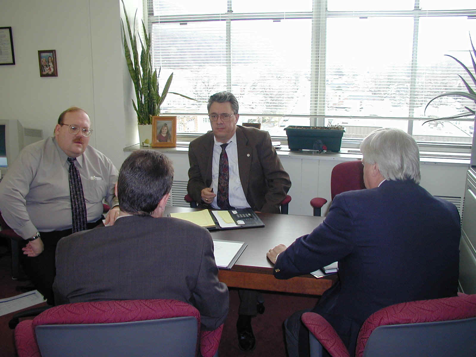Purchasing officials meet with Bureau of Employment Programs' Mark Miller and Clarence Bess