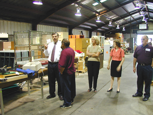 Secretary Burton talks with Federal Warehouse Danny Layton