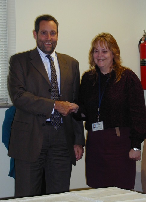Our 2004 Partner in Purchasing, DEP's Tammy Canterbury, is pictured with Purchasing Director Dave Tincher.