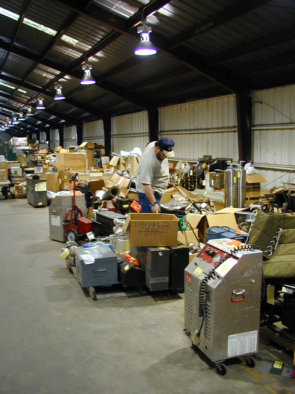 One of many customers who visited the federal surplus property warehouse during the Pre-Inventory Reduction Sale is pictured.