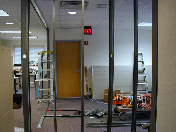 Under Construction...Purchasing Division staff worked among debris from the renovation of the downstairs office space.
